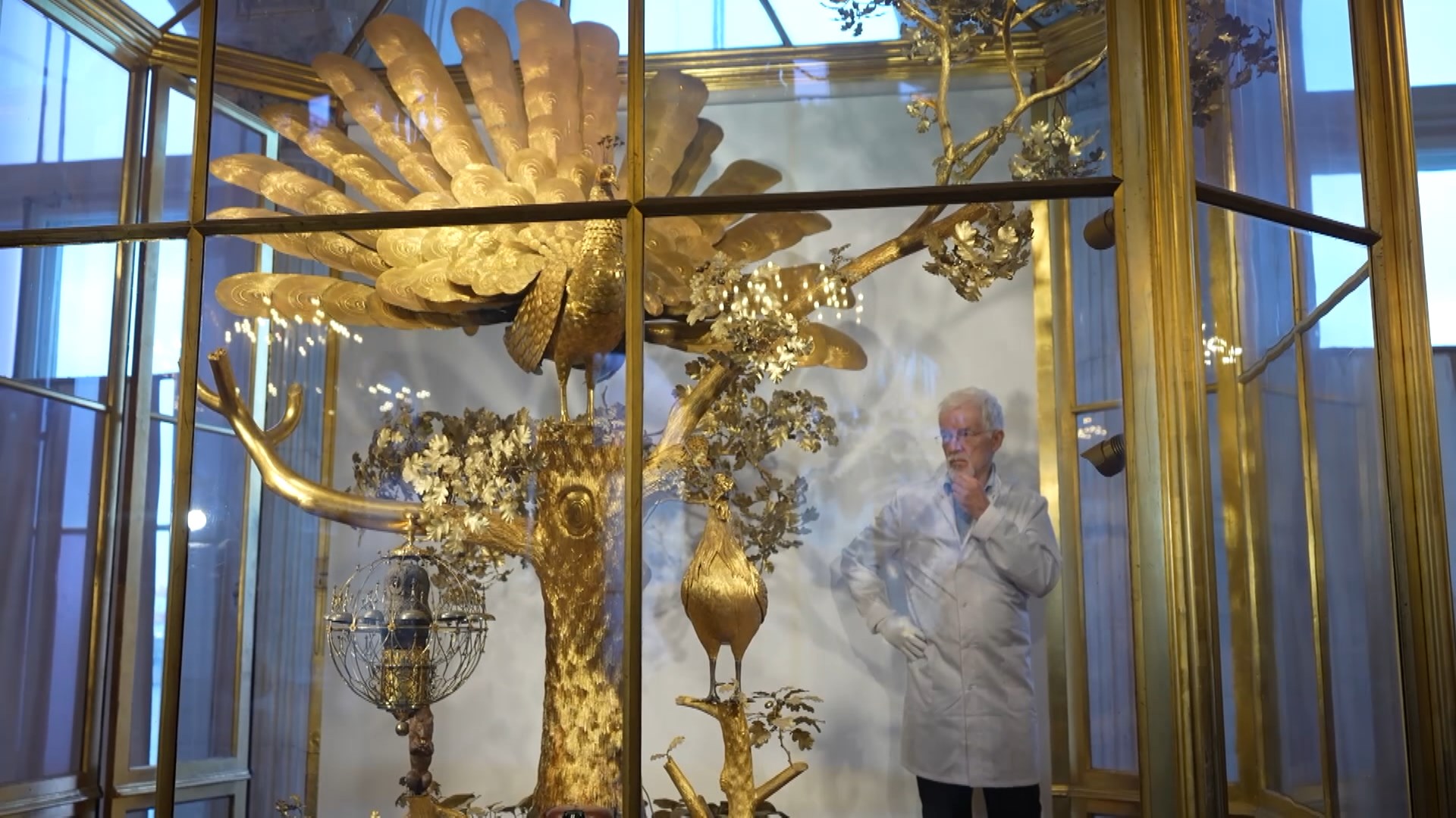 золоченые часа "Павлин"