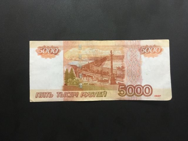 В Ошмянском районе женщина принесла в банк поддельную купюру