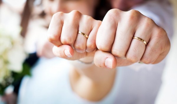depositphotos_46024443-stock-photo-couple-showing-wedding-rings.jpg